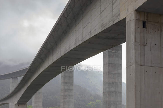 High viaduct under gloomy sky — Stock Photo