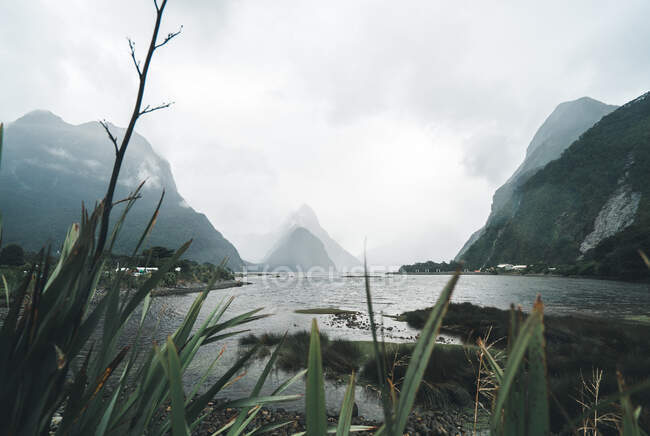 Clouds over mountains and swamp — Stock Photo