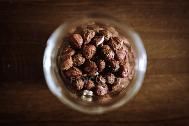 Top view of jar with hazelnuts — Stock Photo