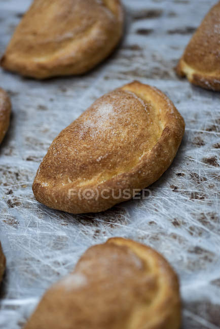 Close-up of baked sweet pastry on wooden table — Stock Photo