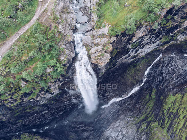 Aerial view of spectacular ravine and waterfall in nature — Stock Photo