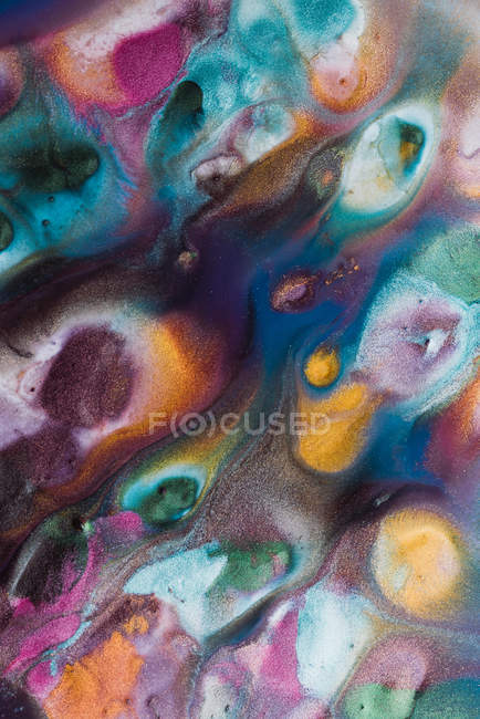 Abstract background of vivid spills of amazing metallic pigment — Stock Photo