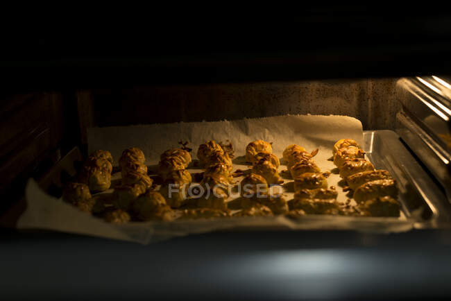 Traditional pastry inside the oven — Stock Photo