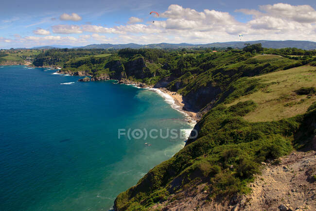 Picturesque drone view of tranquil blue sea near wonderful coast on beautiful sunny day — Stock Photo