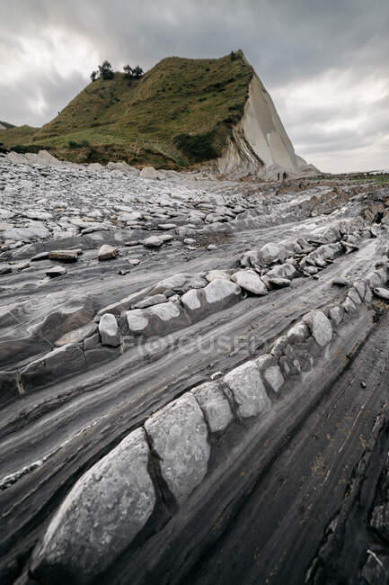 Landscape of rough stone shore — Stock Photo