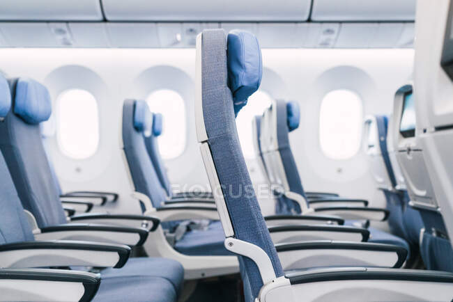 Aisle in modern plane cabin — Stock Photo