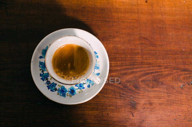 Cup of coffee on table — Stock Photo
