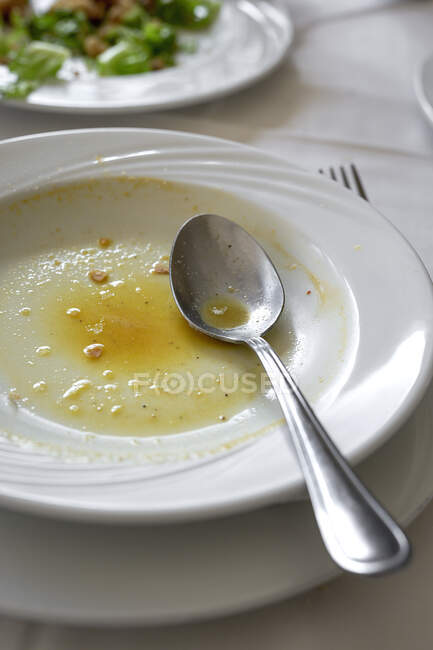Restaurant table ready to eat. Cutlery, napkins, cups; dishes. fish soup; empty — Stock Photo