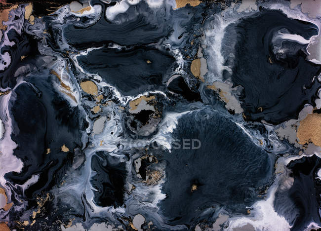 Flujo abstracto de pinturas líquidas en mezcla - foto de stock
