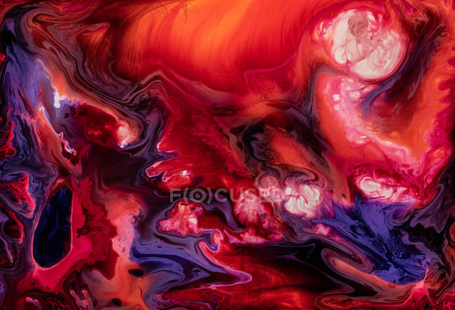 Flux abstrait de peintures liquides en mélange — Photo de stock
