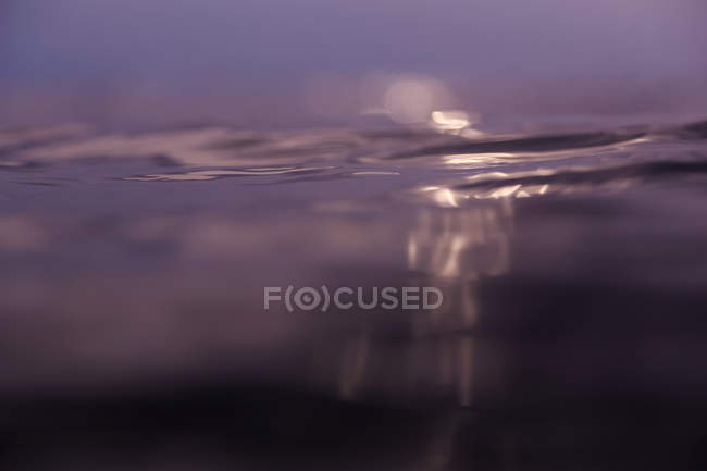 Closeup of ripple sea water on blurred background — Stock Photo