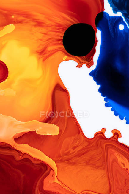 Abstracción de pinturas líquidas en mezcla de flujo de mezcla lenta - foto de stock