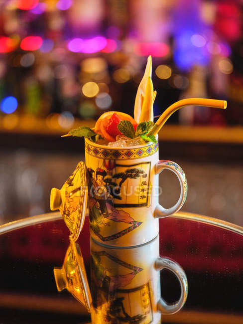 Mug with tropical cocktail — Stock Photo