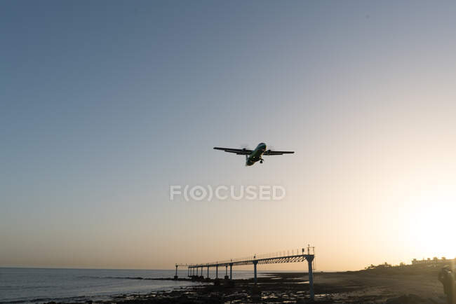 Plane behind security fence — Stock Photo