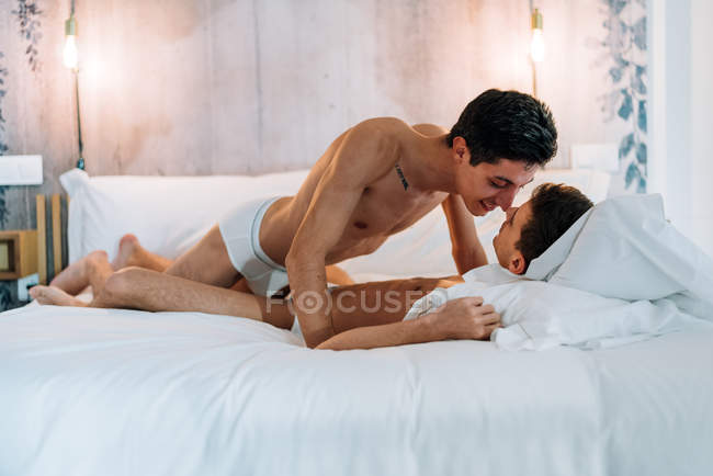 Passionate Sexual Happy Shirtless Gay Couple In An Intimate Moment In The Bed At Home Bedroom Male Stock Photo 255863482