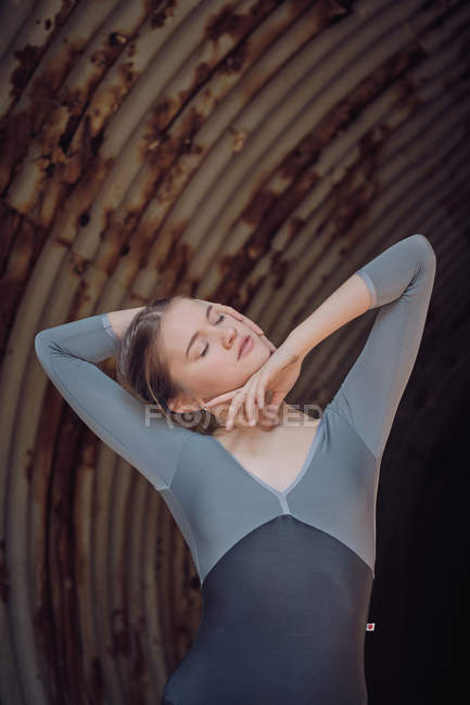 Young ballerina dancing in pipe — Stock Photo