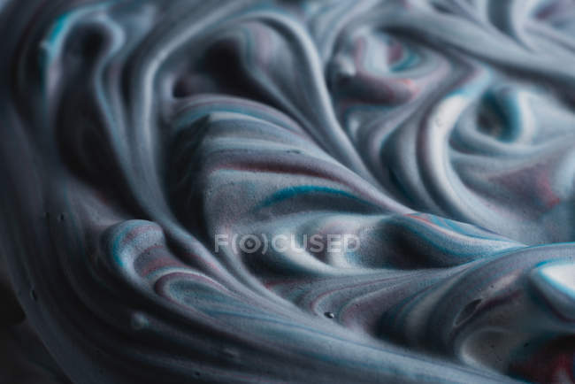 Abstract multicolored shaving cream on white canvas — Stock Photo