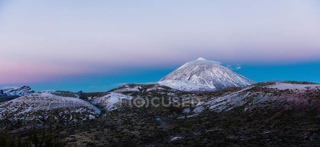 Majestic view of snowy mountain peak against sunset blue sky on Canary Islands, Spain — Stock Photo