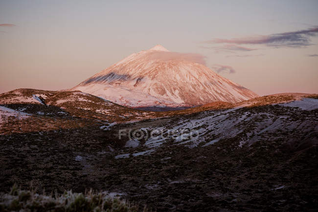 View of snowy mountain peak against sunset blue sky on Canary Islands, Spain — Stock Photo