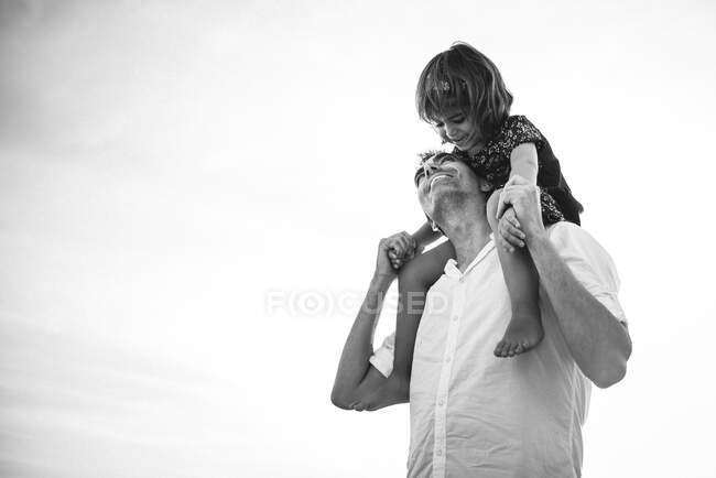 Father holding little daughter — Stock Photo