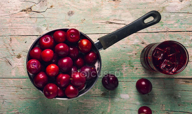 Top view of Saucepan with cherries — Stock Photo