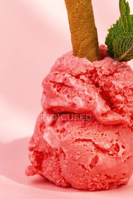 Strawberry ice cream scoops with waffle stick, close-up — Stock Photo