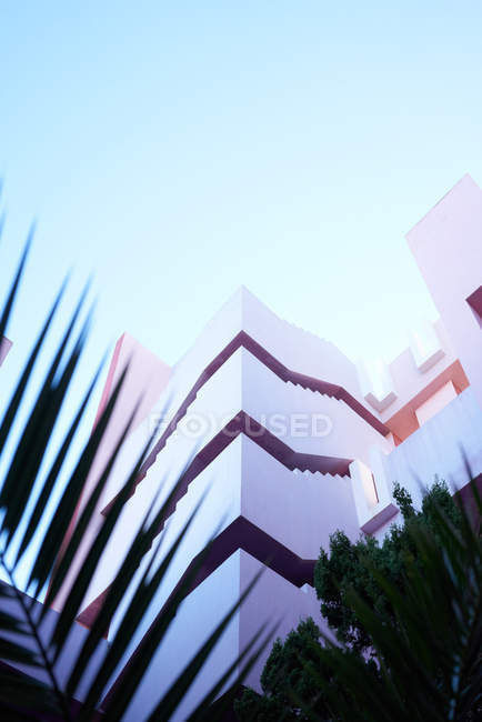 Traditional construction of pink building with stairs — Stock Photo