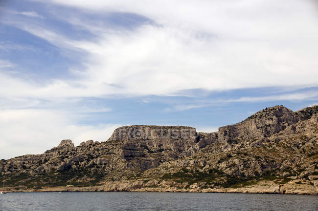 Beautiful limestone rocks on seashore — Stock Photo