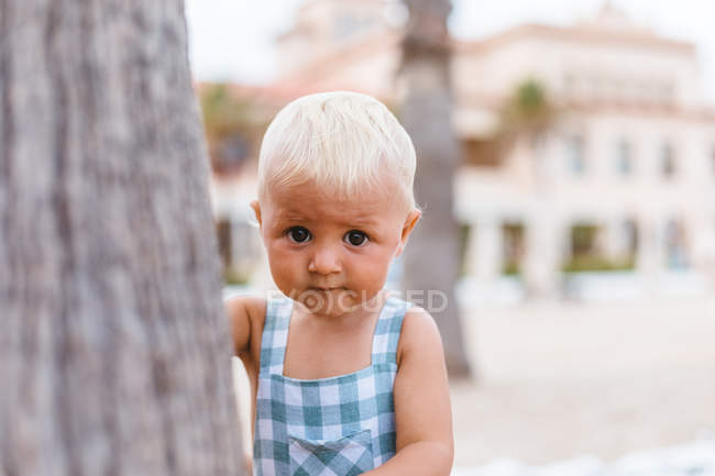 Portrait of a blonde baby boy on the beach — Stock Photo
