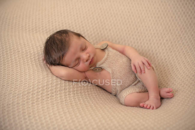 Portrait of baby asleep in bed — Stock Photo