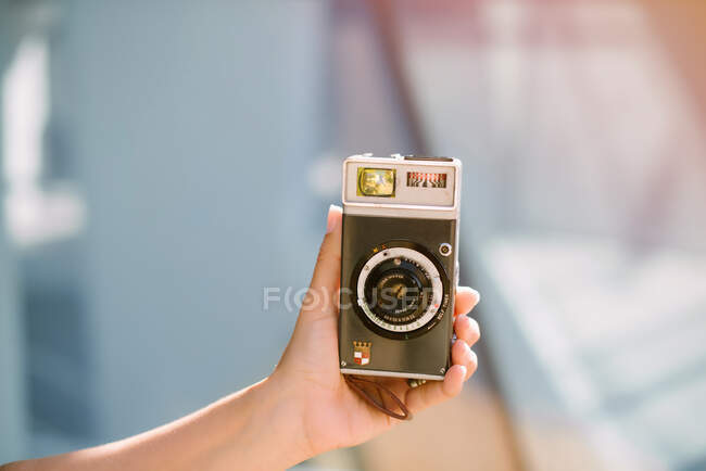 Woman capturing moment taking picture on camera — Stock Photo
