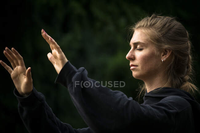 Focused woman during martial arts training — Stock Photo