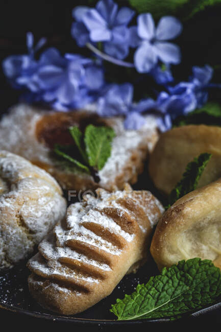 Traditional homemade Arab sweets on dark background. Ramadan. Islamic. Halal — Stock Photo