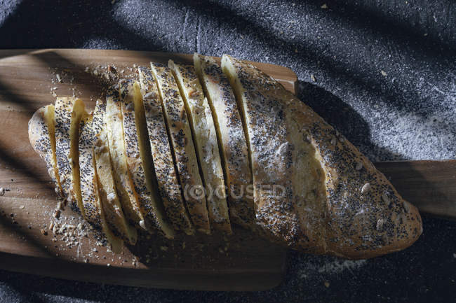 Neatly sliced organic bread for breakfast — Stock Photo