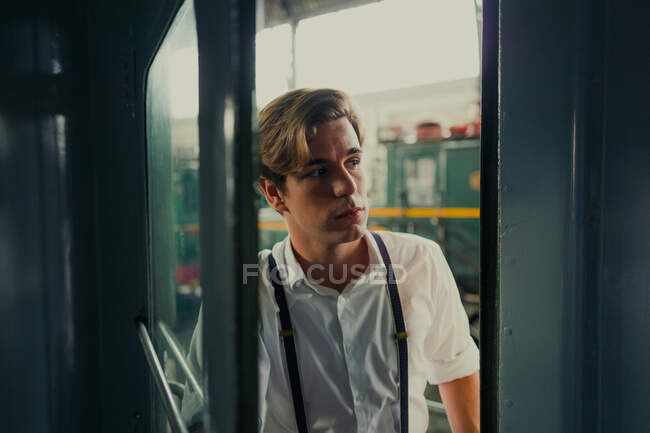 Traveler looking out train window — Stock Photo