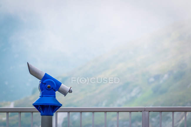 Viewing platform with coin-operated telescope in Austrian mountains in misty weather with zero visibility — Stock Photo