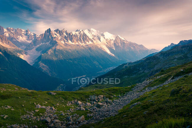 Snowy mountains on cloudy day — Stock Photo