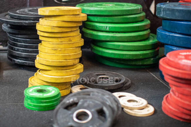 Bright weights in gym — Stock Photo