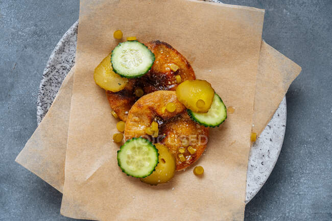 High cuisine dish with cucumbers — Stock Photo