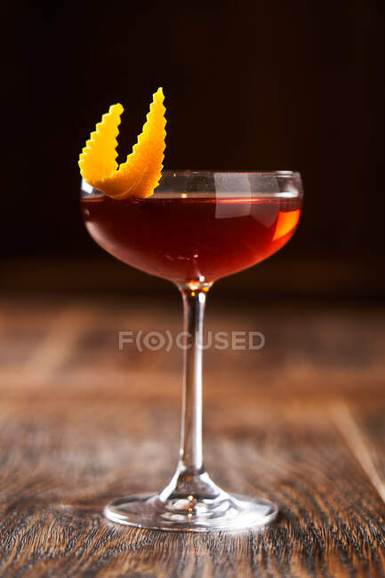Martinez cocktail with orange zest — Stock Photo