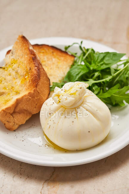 Simple high cuisine dish with bread — Stock Photo