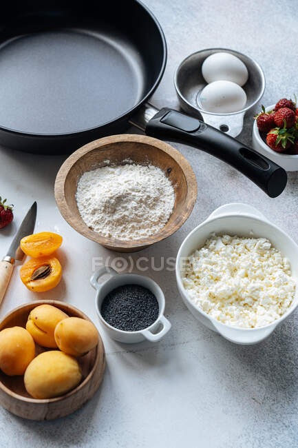 Dessert ingredients around frying pan — Stock Photo