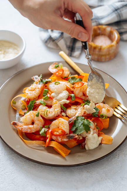 Tasty shrimp salad on table — Stock Photo