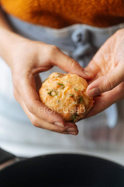 Woman making meatless cutlets at home — Stock Photo