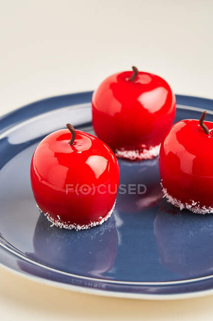 Apple shaped dessert on plate — Stock Photo