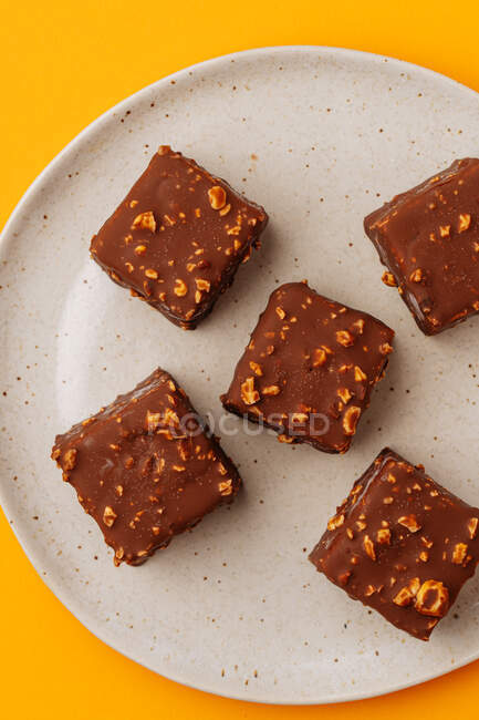Cookies with chocolate and nut icing — Stock Photo