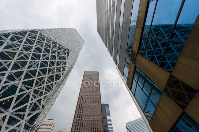 Modern buildings against cloudy sky — Stock Photo
