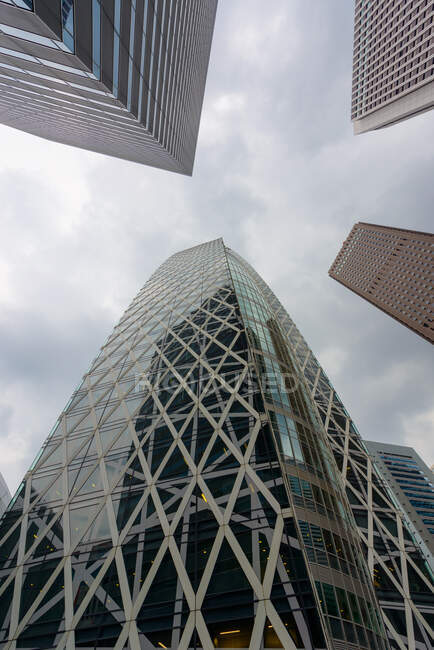 Modern buildings against cloudy sky — Stock Photo