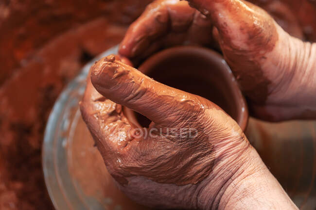 Crop potter making pot in workshop — Stock Photo
