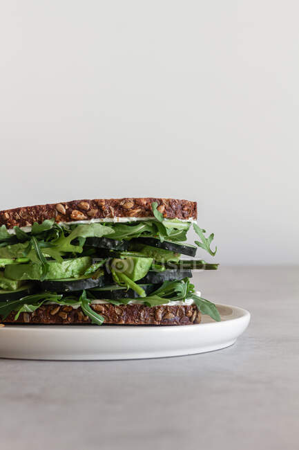 Healthy sandwich with green vegetables and herbs — Stock Photo